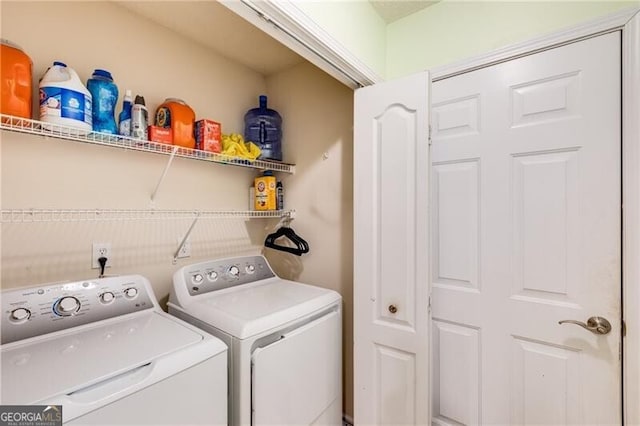 115 Pinnacle Ln, Mcdonough, GA 30253 - laundry area with washing machine and clothes dryer