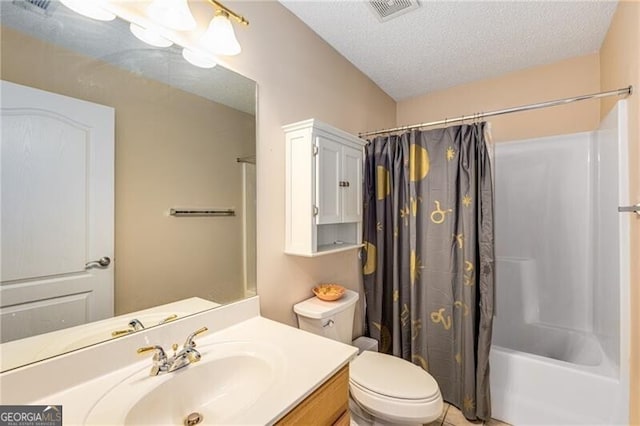 115 Pinnacle Ln, Mcdonough, GA 30253 - bathroom with vanity, toilet, shower / tub combo, a textured ceiling, and tile patterned flooring