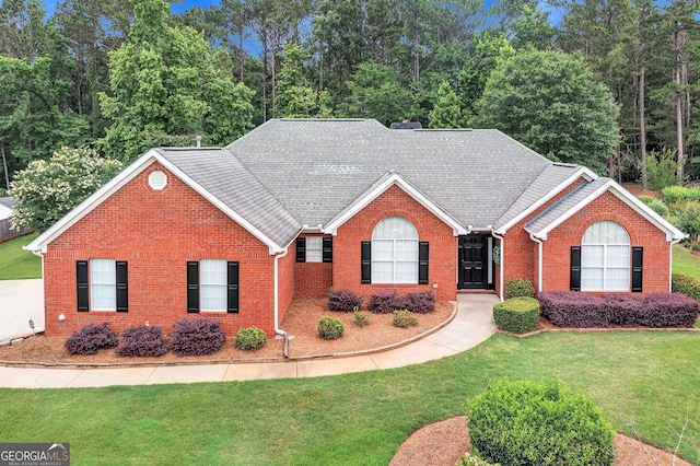 70 Merion Way, Newnan, GA 30265 - ranch-style house with brick siding, a front lawn, and a shingled roof