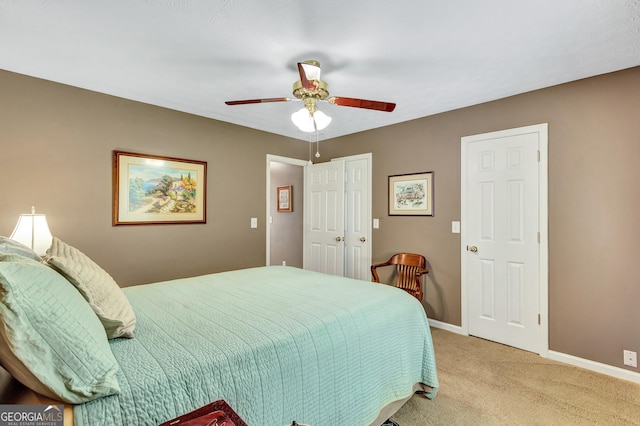 70 Merion Way, Newnan, GA 30265 - bedroom featuring light colored carpet, baseboards, and ceiling fan