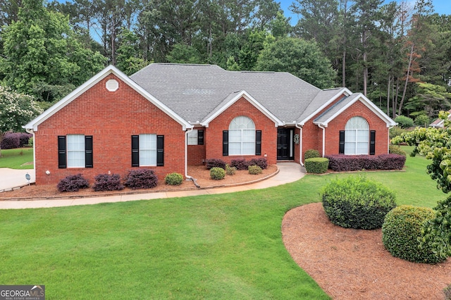 70 Merion Way, Newnan, GA 30265 - single story home featuring brick siding, a front yard, and roof with shingles