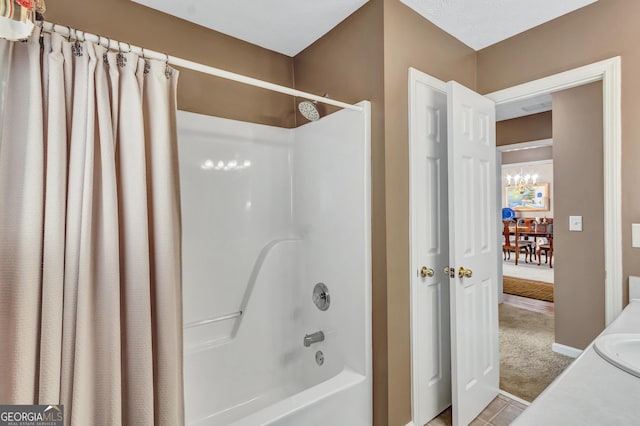 70 Merion Way, Newnan, GA 30265 - full bath with a chandelier, shower / bath combo with shower curtain, and vanity
