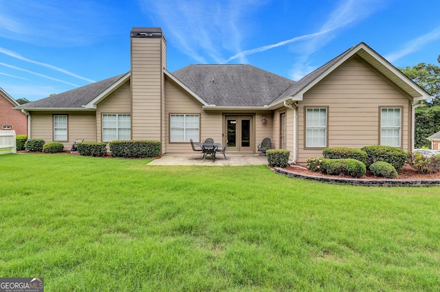 70 Merion Way, Newnan, GA 30265 - rear view of house featuring a chimney, a lawn, a patio area, a shingled roof, and french doors