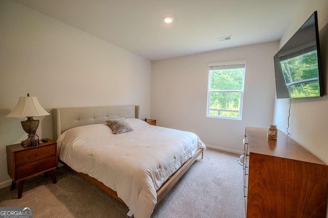 6827 Chataran Dr, Lithia Springs, GA 30122 - bedroom with light carpet and baseboards