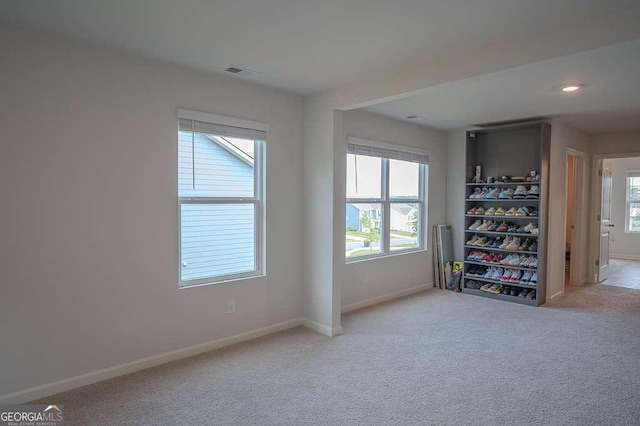 6827 Chataran Dr, Lithia Springs, GA 30122 - empty room featuring baseboards and carpet flooring