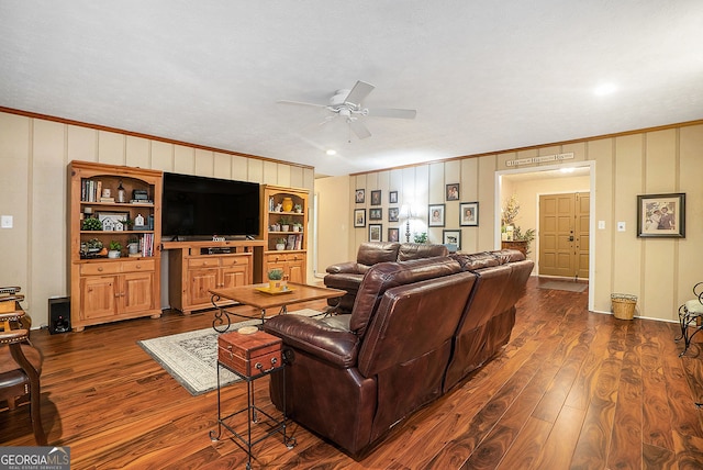 1310 Chilton Woods Rd, Rutledge, GA 30663 - living area with crown molding, a ceiling fan, and dark wood-style flooring