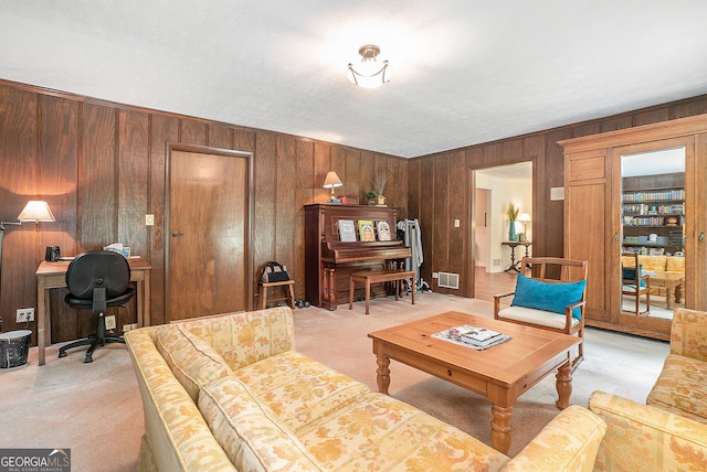 1310 Chilton Woods Rd, Rutledge, GA 30663 - living room featuring light carpet, wooden walls, and a desk