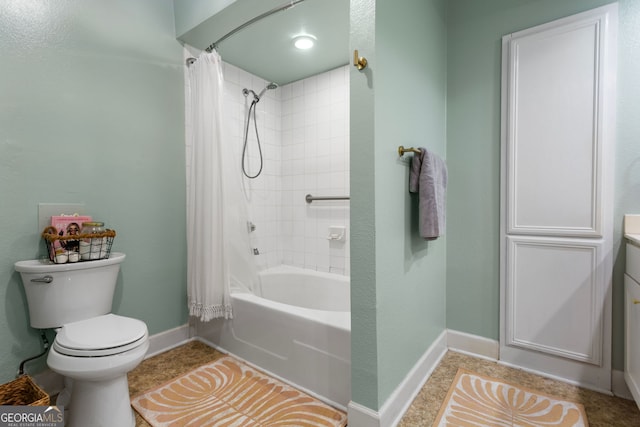 3777 Peachtree Rd NE Unit 1112, Brookhaven, GA 30319 - full bath featuring baseboards, toilet, shower / bath combo with shower curtain, and vanity