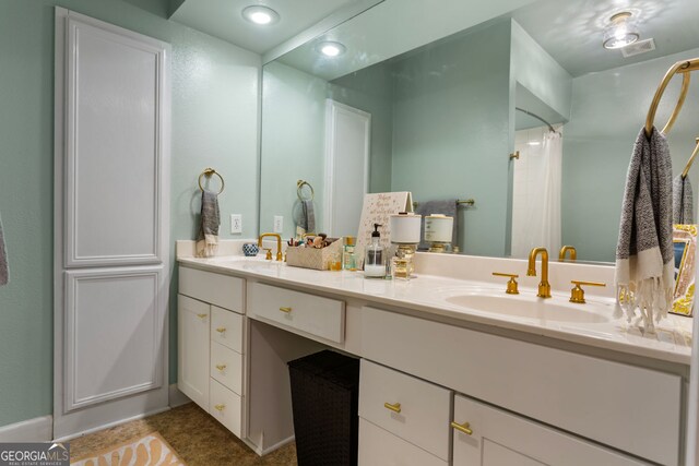 3777 Peachtree Rd NE Unit 1112, Brookhaven, GA 30319 - bathroom featuring double vanity, recessed lighting, and tile patterned floors