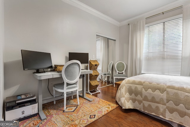 3777 Peachtree Rd NE Unit 1112, Brookhaven, GA 30319 - bedroom featuring ornamental molding, wood finished floors, and an office area