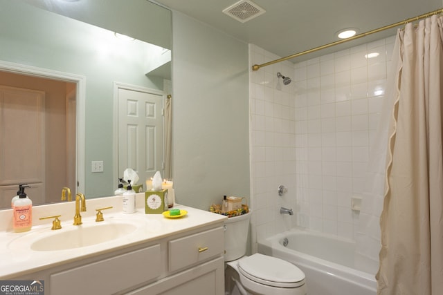 3777 Peachtree Rd NE Unit 1112, Brookhaven, GA 30319 - full bathroom with vanity, shower / tub combo with curtain, and toilet