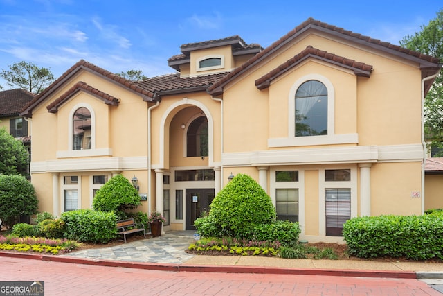 3777 Peachtree Rd NE Unit 1112, Brookhaven, GA 30319 - mediterranean / spanish-style home featuring stucco siding and a tile roof