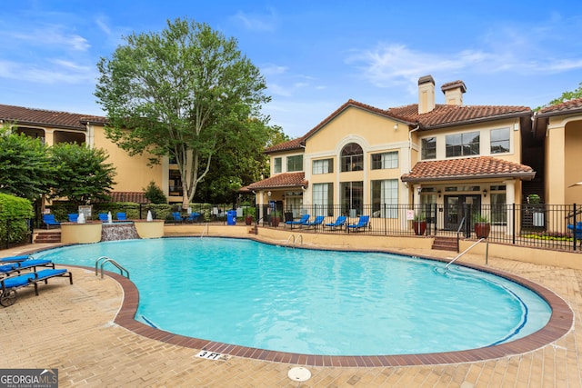 3777 Peachtree Rd NE Unit 1112, Brookhaven, GA 30319 - community pool featuring a patio area