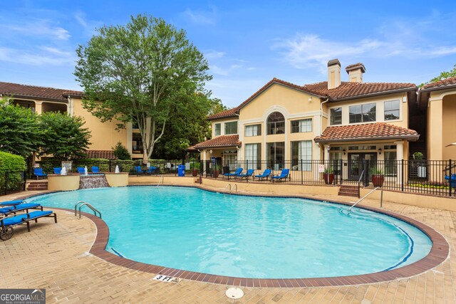 3777 Peachtree Rd NE Unit 1112, Brookhaven, GA 30319 - community pool featuring a patio area
