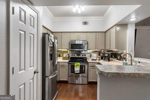 3777 Peachtree Rd NE Unit 1112, Brookhaven, GA 30319 - kitchen featuring stainless steel appliances, crown molding, a peninsula, dark wood finished floors, and light countertops