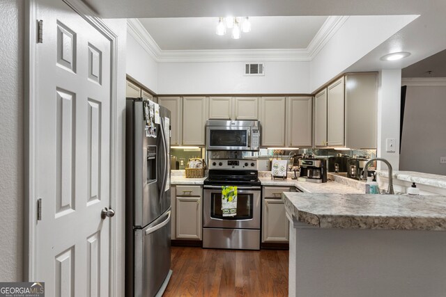 3777 Peachtree Rd NE Unit 1112, Brookhaven, GA 30319 - kitchen featuring stainless steel appliances, crown molding, a peninsula, dark wood finished floors, and light countertops