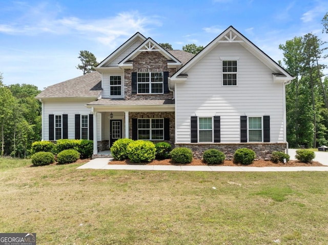 2855 Pilgrim Mill Rd, Cumming, GA 30041 - craftsman-style home with stone siding and a front lawn
