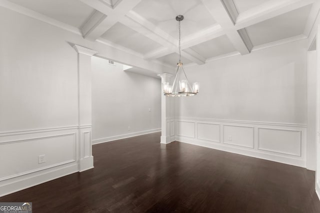 2855 Pilgrim Mill Rd, Cumming, GA 30041 - unfurnished dining area with coffered ceiling, a chandelier, beamed ceiling, wood finished floors, and a wainscoted wall