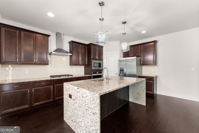 2855 Pilgrim Mill Rd, Cumming, GA 30041 - kitchen featuring appliances with stainless steel finishes, wall chimney exhaust hood, a sink, dark brown cabinets, and recessed lighting