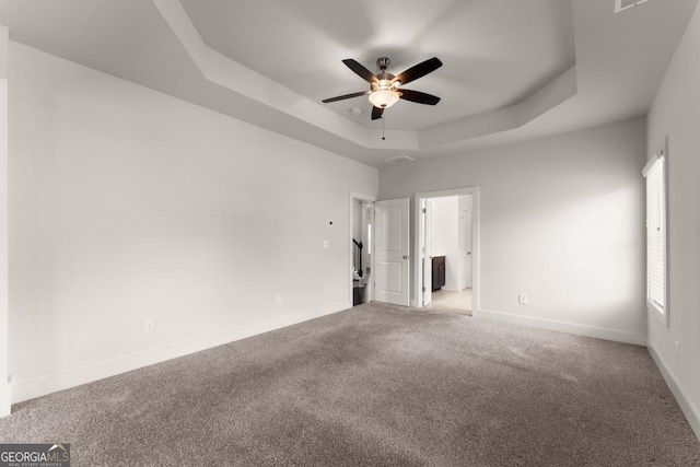 2855 Pilgrim Mill Rd, Cumming, GA 30041 - unfurnished room with a raised ceiling, ceiling fan, and carpet