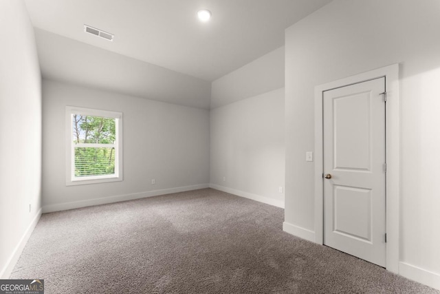 2855 Pilgrim Mill Rd, Cumming, GA 30041 - carpeted empty room featuring baseboards and vaulted ceiling