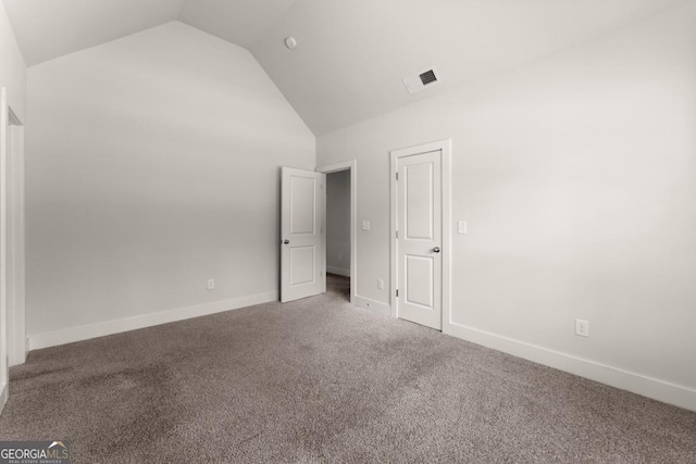 2855 Pilgrim Mill Rd, Cumming, GA 30041 - unfurnished bedroom featuring lofted ceiling, carpet, and baseboards