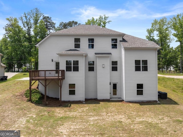 2855 Pilgrim Mill Rd, Cumming, GA 30041 - rear view of house featuring a yard, a deck, and a shingled roof