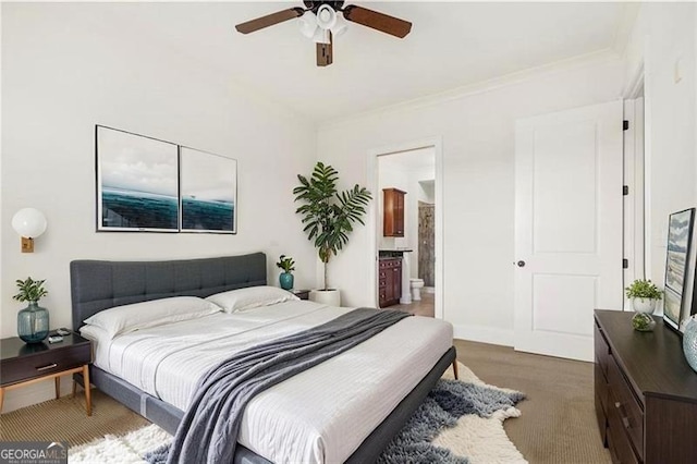 3635 Paces Cir Unit 1405, Atlanta, GA 30326 - bedroom featuring ensuite bathroom, crown molding, a ceiling fan, baseboards, and wood finished floors