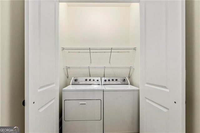 3635 Paces Cir Unit 1405, Atlanta, GA 30326 - laundry room featuring separate washer and dryer