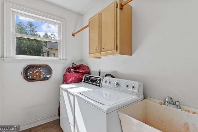 3498 Overland Trl, Ellenwood, GA 30294 - washroom featuring cabinet space and washing machine and dryer