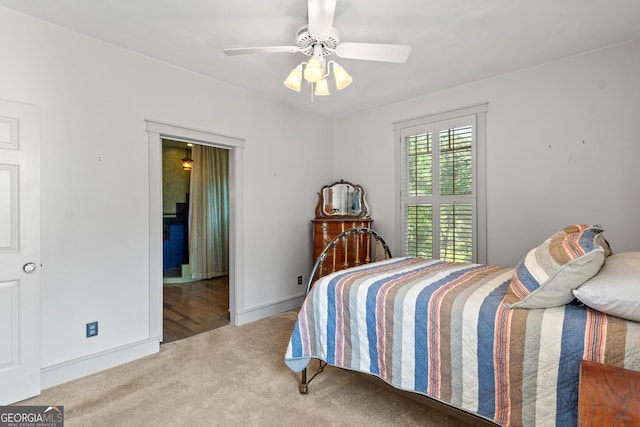 3498 Overland Trl, Ellenwood, GA 30294 - carpeted bedroom featuring baseboards and ceiling fan