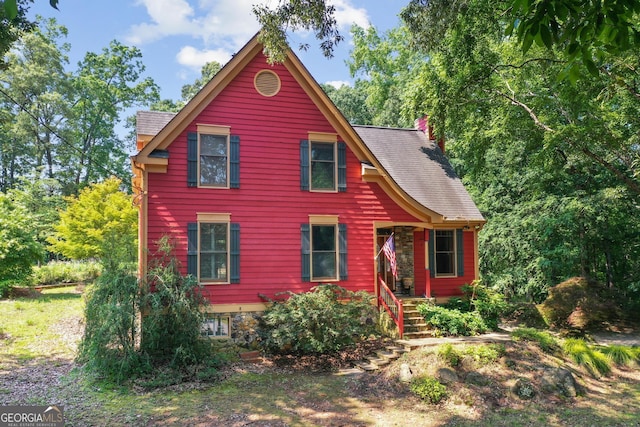 3498 Overland Trl, Ellenwood, GA 30294 - cabin with a chimney and roof with shingles