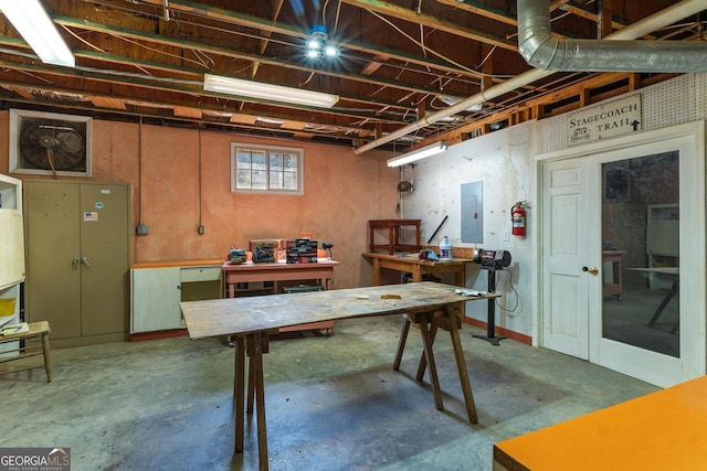 3498 Overland Trl, Ellenwood, GA 30294 - below grade area featuring a workshop area and electric panel