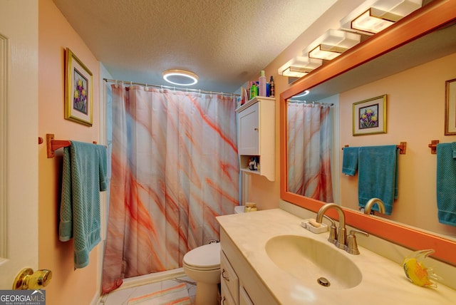 227 Shakespeare Dr # 303, Clayton, GA 30525 - bathroom featuring vanity, toilet, a shower with shower curtain, and a textured ceiling