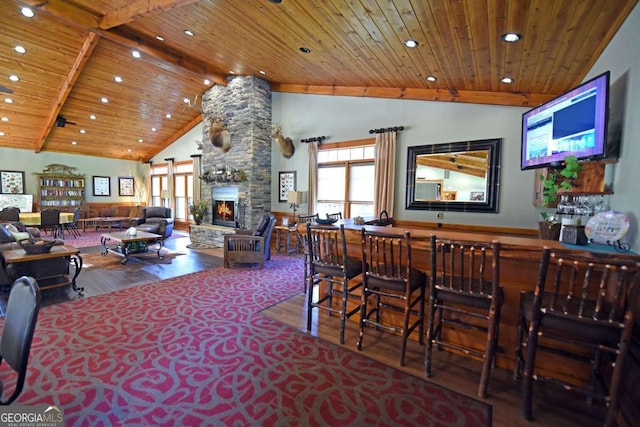 101 Porch View Cir Unit 121, Blairsville, GA 30512 - bar with wood finished floors, wooden ceiling with exposed beams, healthy amount of natural light, recessed lighting, and a stone fireplace