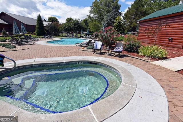 101 Porch View Cir Unit 121, Blairsville, GA 30512 - community pool featuring a community hot tub and a patio area