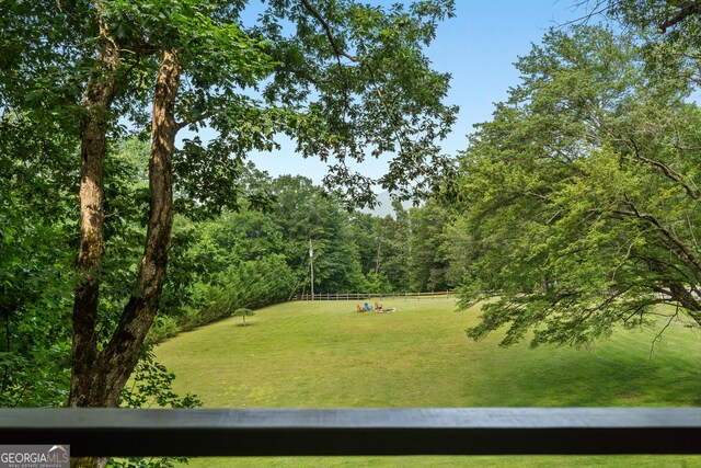 534 Mountainside Dr, Rabun Gap, GA 30568 - view of grassy yard featuring a wooded view