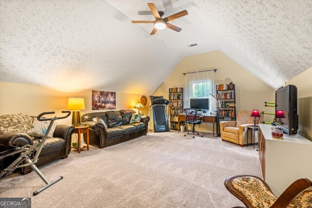 534 Mountainside Dr, Rabun Gap, GA 30568 - living area with a textured ceiling, light carpet, a ceiling fan, lofted ceiling, and an office area