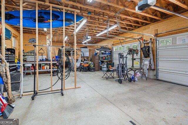 534 Mountainside Dr, Rabun Gap, GA 30568 - garage featuring a garage door opener
