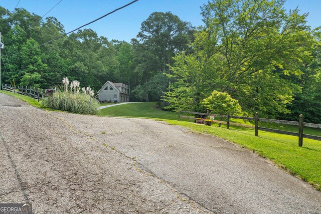 534 Mountainside Dr, Rabun Gap, GA 30568 - view of asphalt road with a wooded view