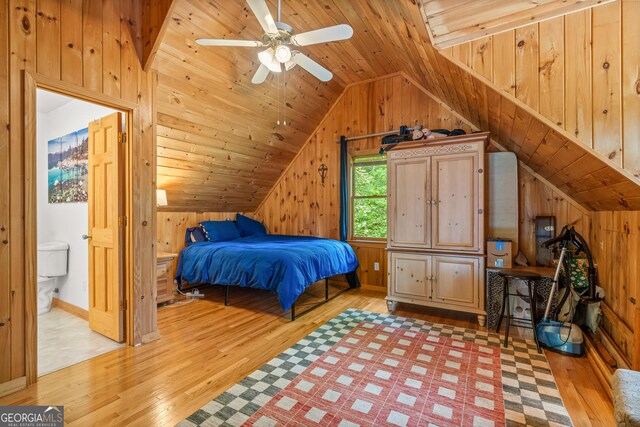 534 Mountainside Dr, Rabun Gap, GA 30568 - bedroom with light wood finished floors, vaulted ceiling, wood walls, and wooden ceiling