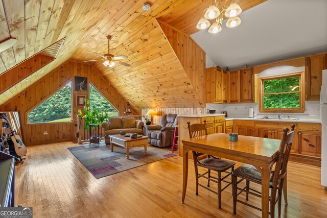 534 Mountainside Dr, Rabun Gap, GA 30568 - dining space with plenty of natural light, vaulted ceiling, light wood-style flooring, wood ceiling, and a ceiling fan