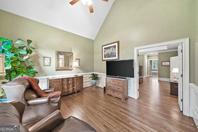 120 Forest Breeze Cv, Alpharetta, GA 30022 - living room featuring ceiling fan, high vaulted ceiling, wood finished floors, and a wainscoted wall