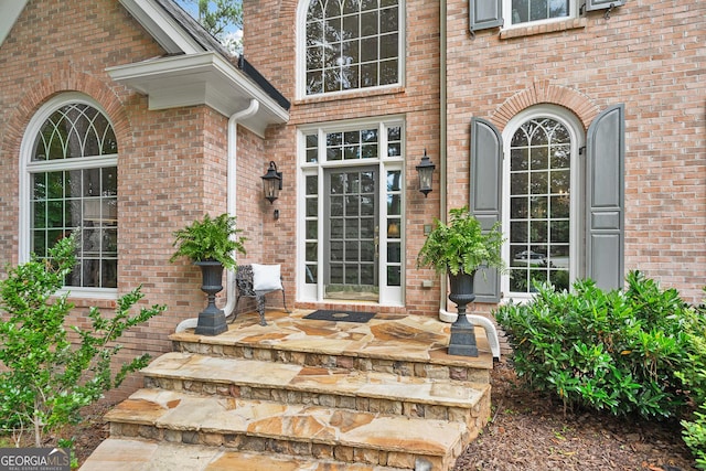 120 Forest Breeze Cv, Alpharetta, GA 30022 - property entrance featuring brick siding