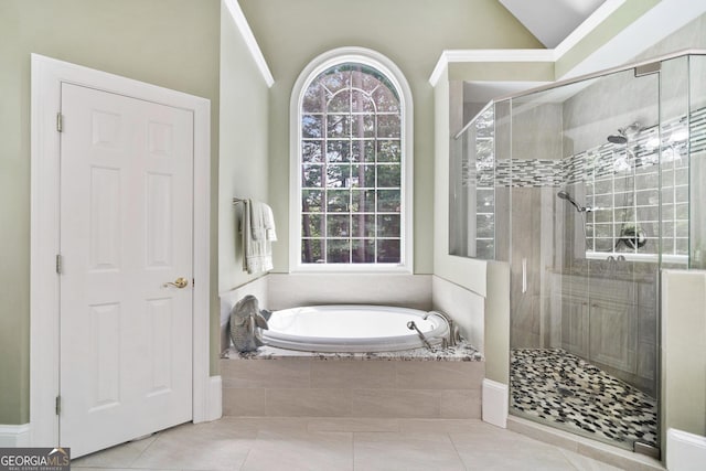 120 Forest Breeze Cv, Alpharetta, GA 30022 - bathroom with a garden tub, a shower stall, lofted ceiling, and tile patterned flooring