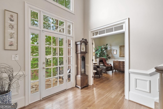 120 Forest Breeze Cv, Alpharetta, GA 30022 - entryway featuring light wood-style floors and french doors