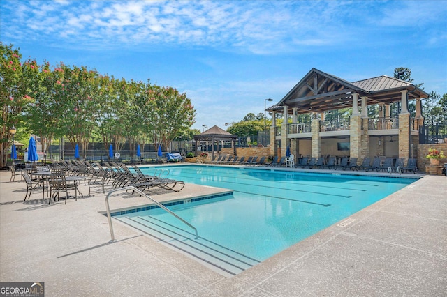 120 Forest Breeze Cv, Alpharetta, GA 30022 - community pool with a patio