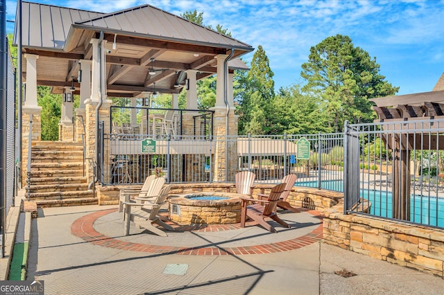 120 Forest Breeze Cv, Alpharetta, GA 30022 - view of patio featuring an outdoor fire pit