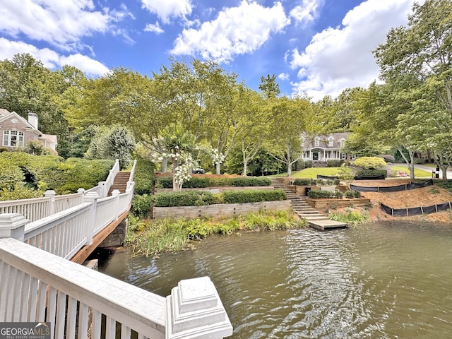 120 Forest Breeze Cv, Alpharetta, GA 30022 - dock featuring a water view and view of wooded area