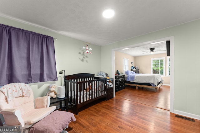 157 Glendale Hts, Winterville, GA 30683 - bedroom with wood finished floors and baseboards